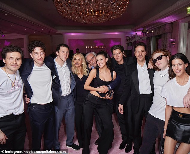 It's clear Nicola's billionaire family has a very tight-knit bond as she continues to show off their 'perfect' dynamic in front of the Beckhams amid the ongoing feud on social media (Brooklyn, Greg, Matthew, Claudia, Nelson, Nicola, Will, Brad, Zach and Brittany pictured L-R)