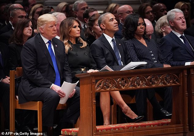 Their friendly banter at Carter's funeral was also in stark contrast to how they appeared together at the funeral of former President George H.W. Bush in December 2018 (pictured)