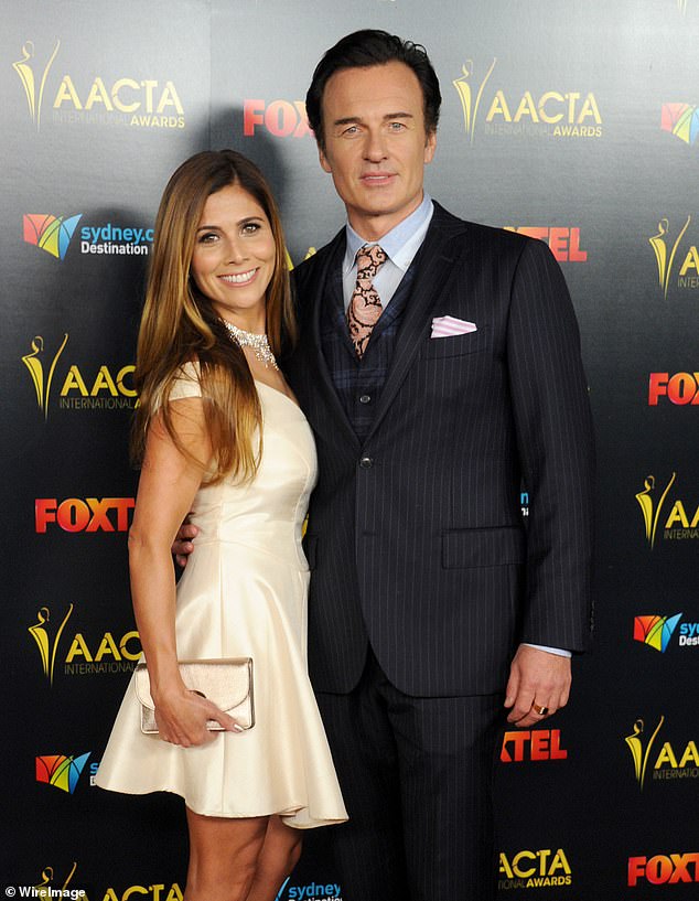 The mystery surrounding Julian McMahon's death in the US has raised many questions. Pictured Julian and wife Kelly Paniagua