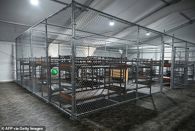 Beds behind cages inside the detention centre in the Everglades, which is designed to house 3,000 migrants