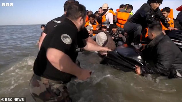 Cops were shown slashing the dinghy with knives in their latest attempt to foil migrants and refugees from making the perilous crossing