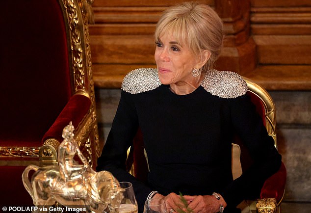 Two women convicted of defaming French first lady Brigitte Macron (pictured) by saying she was ‘born a man’ were today sensationally cleared on appeal