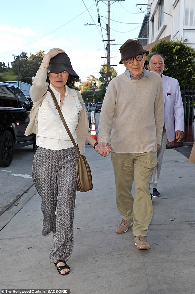 Woody Allen held hands with his third wife Soon-Yi Previn as the enjoyed a date night at Italian restaurant Giorgio Baldi in Santa Monica, CA on Saturday
