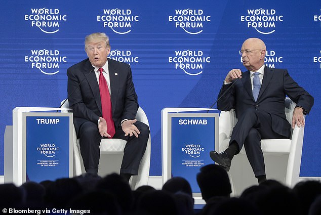 US President Donald Trump, left, speaks with Klaus Schwab, chairman of the World Economic Forum (WEF)