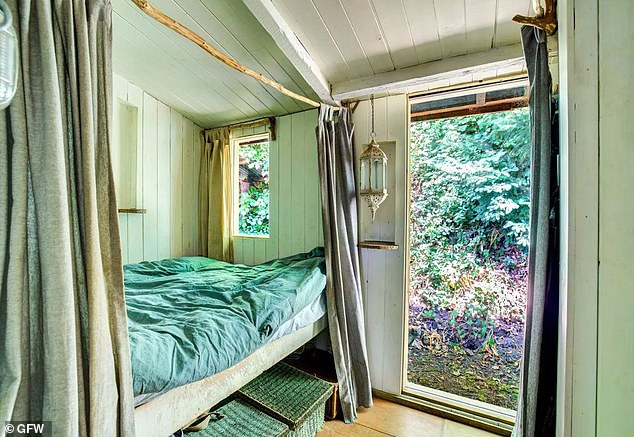 In nature: The cabin has two bedrooms with views to the woodland outside