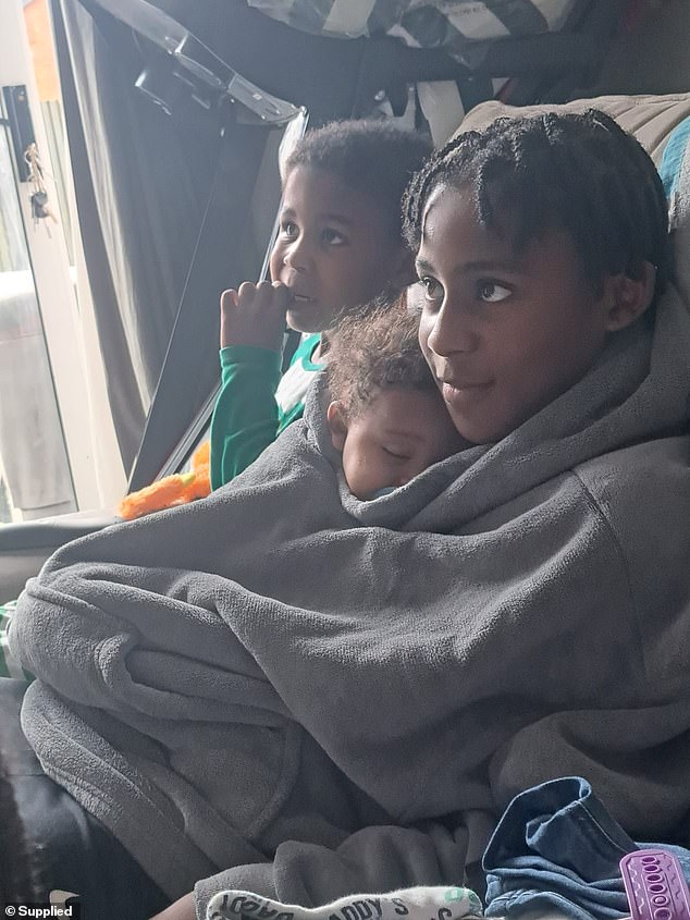 Ricardo Jnr pictured with two of his younger siblings