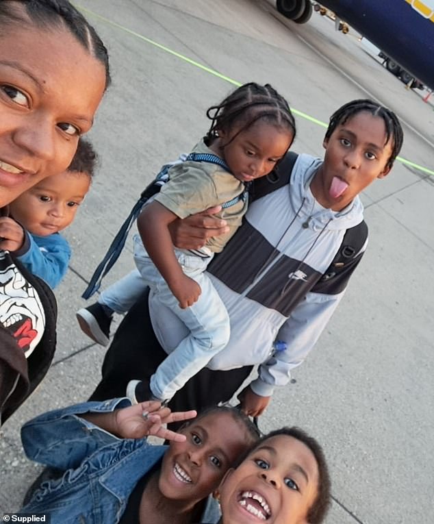 Ricardo Junior is pictured getting ready to board a plane alongside his siblings Casius, six, Cleopatra, five, Asher, three, baby brother Exodus and mother Shanice