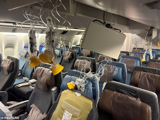 The interior of Singapore Airlines flight SQ321 is pictured after an emergency landing at Bangkok's Suvarnabhumi International Airport in May 2024