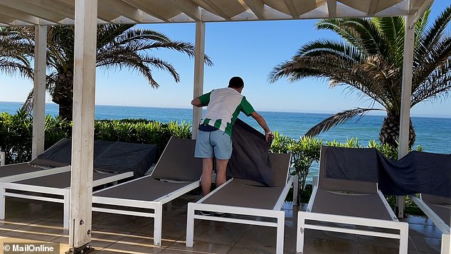 The rush to claim limited loungers has resulted in 'stampedes,' heated arguments and even physical fights between frustrated guests - now hotels are fighting back