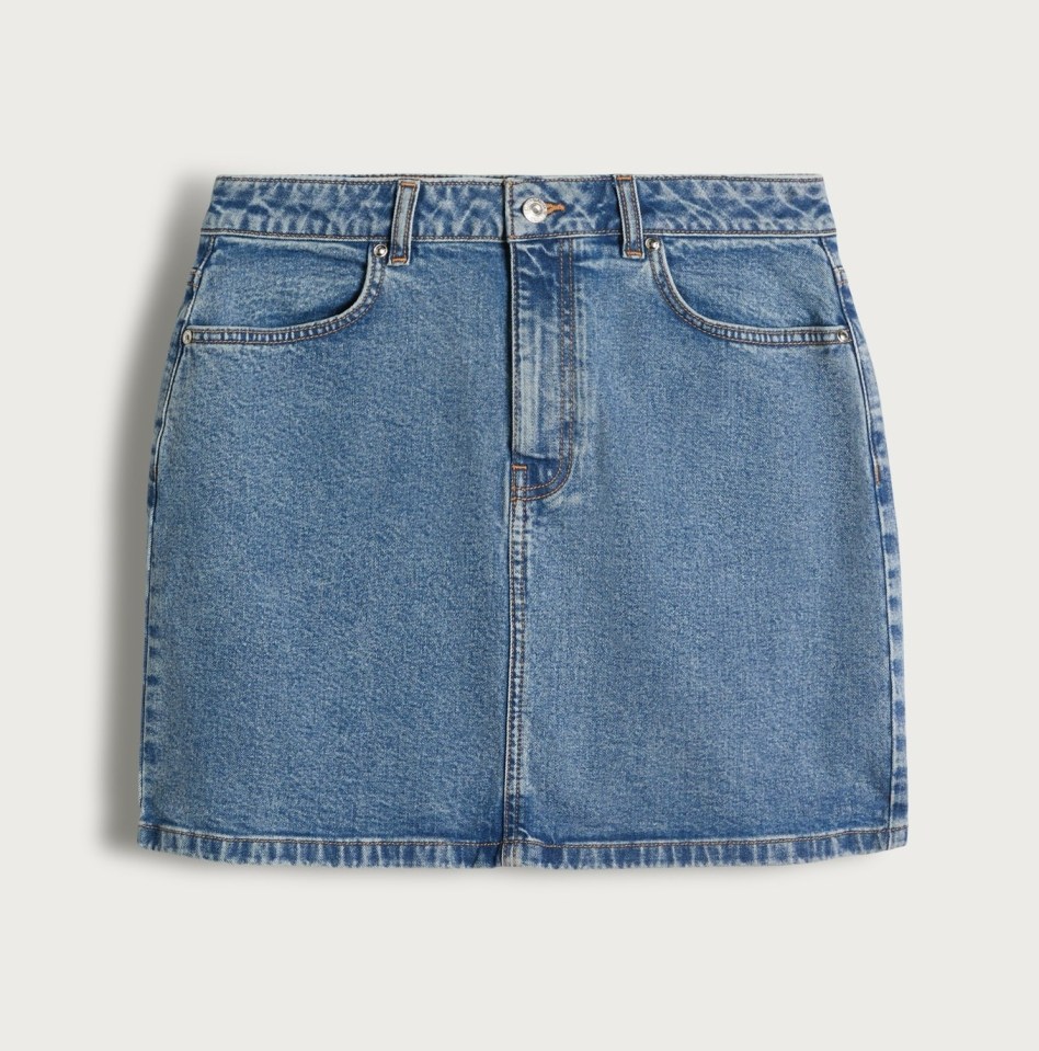 Light wash denim mini skirt.