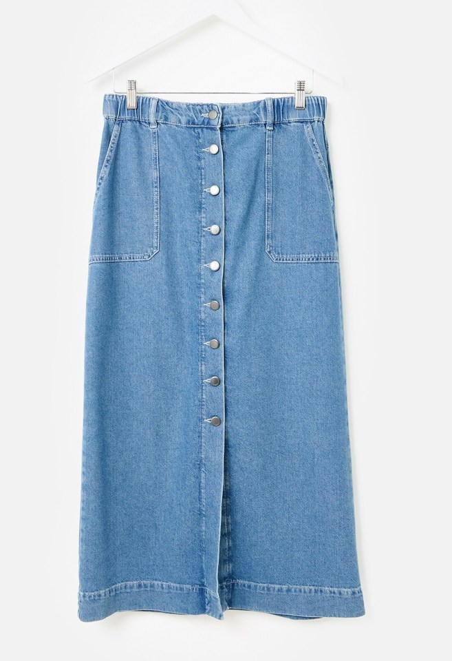 Light blue denim midi skirt with buttons.