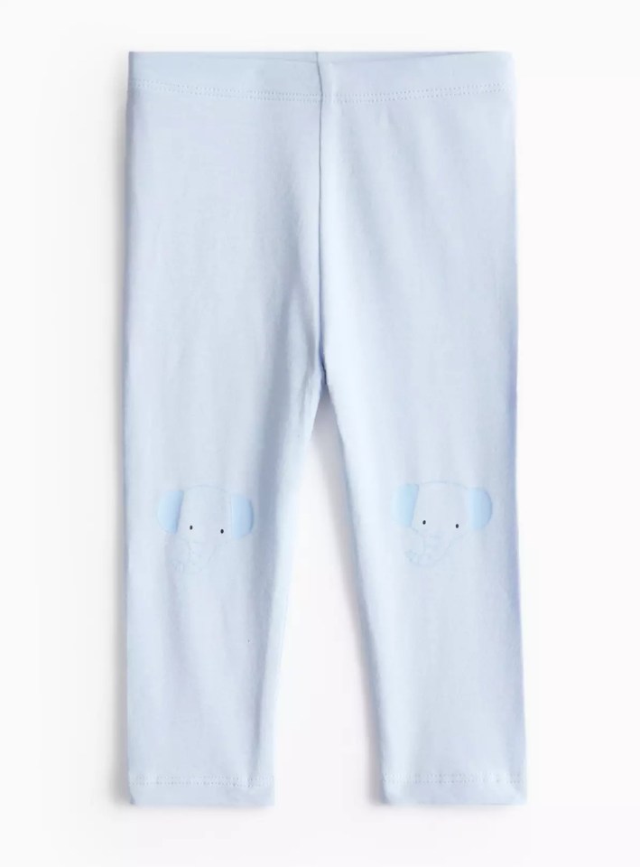 Light blue children's leggings with elephant appliqués.