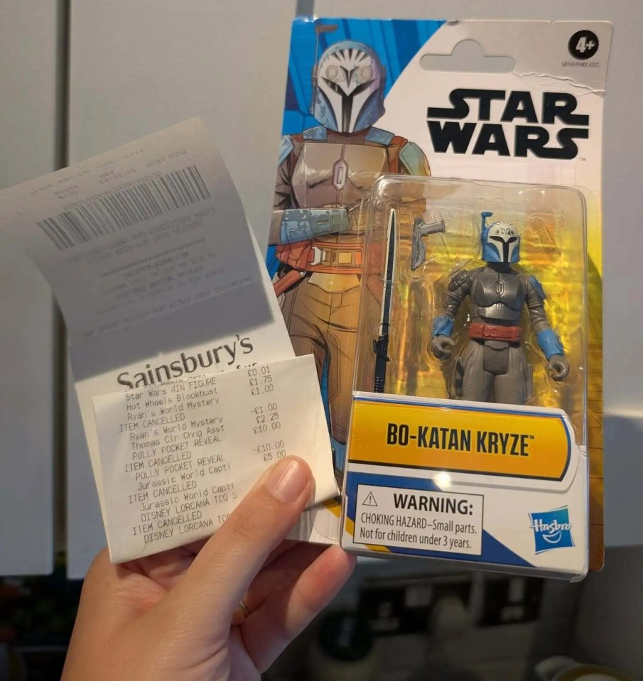 A receipt and a Star Wars Bo-Katan Kryze action figure.