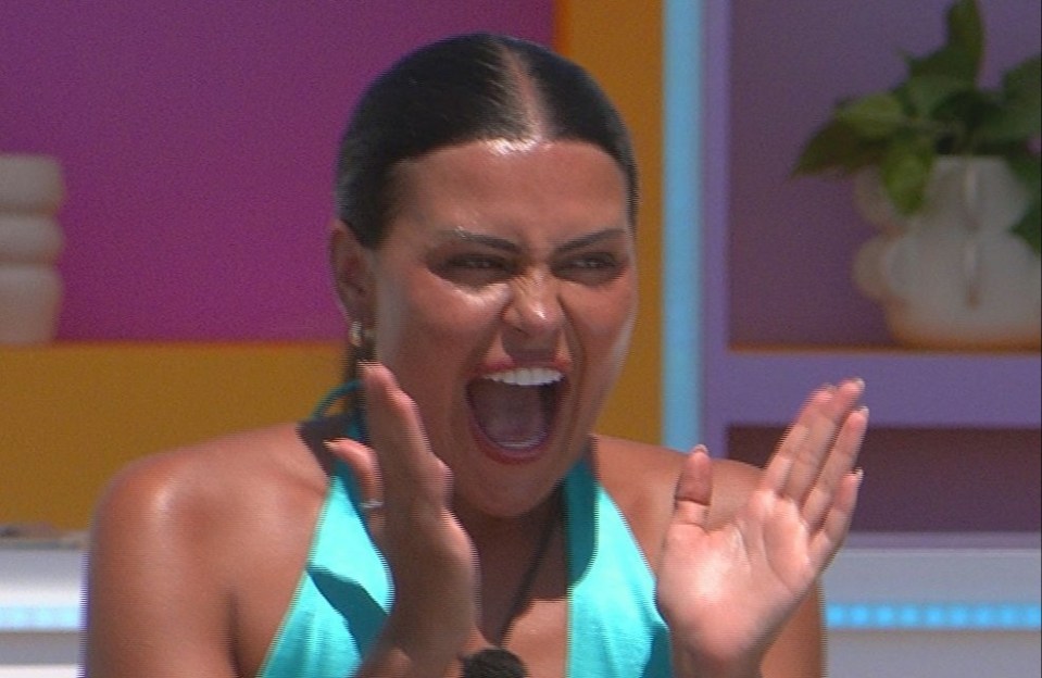 Two women reacting excitedly on a television show.