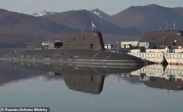 Two Russian Yasen-class cruise missile submarines docked at the Rybachiy submarine base