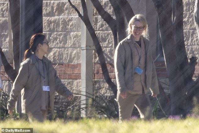 The disgraced British socialite will now be held in the same prison as Theranos scammer Elizabeth Holmes, seen in February at the prison