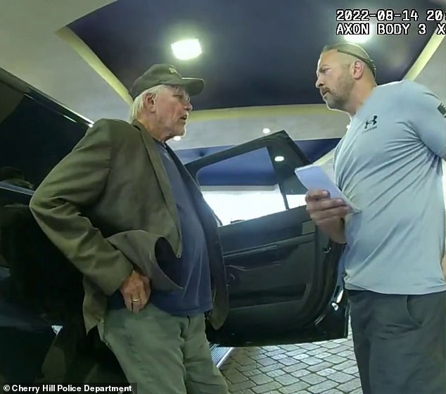 Busey was accused of inappropriately touching two women's buttocks during a photo shoot at Monster Mania at the Doubletree Hotel in Camden on August 13, 2022 - and trying to unhook another victim's bra - pictured being questioned by police at the event