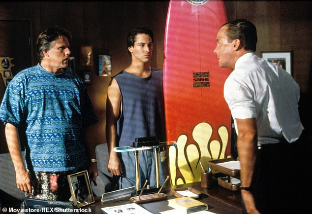 Oscar nominee Busey is pictured in Point Break with Keanu Reeves in 1991