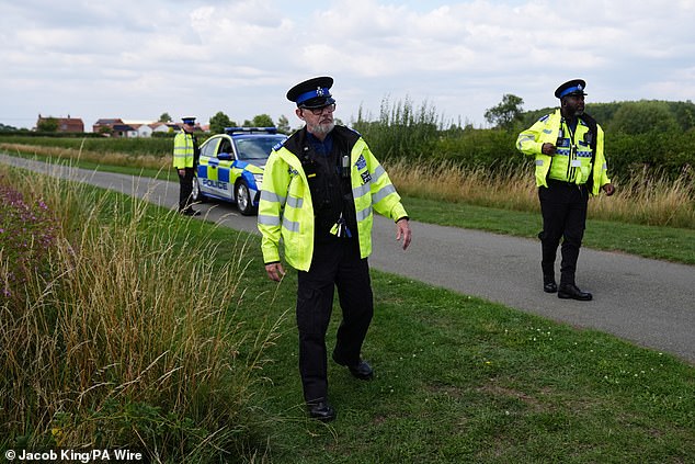 A local resident, who didn't want to be named, said: ‘We haven't seen any white-suited forensics teams, but what we assume are detectives have been coming in and out, and taking bags of stuff away'