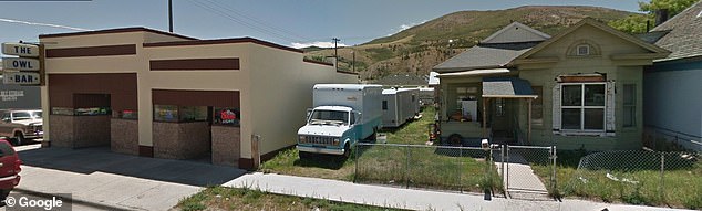 The Owl Bar, left, is situated right beside Brown's house, right, according to records