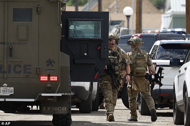 SWAT teams also raided Brown's property, but he was not inside. According to records Brown's home is directly adjacent to the bar