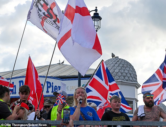 SOUTHSEA: Anti-migrant demonstrators face off against protesters from Stand Up to Racism outside the Royal Beach Hotel in Southsea, Hants, this evening, Friday 1st August 2025.