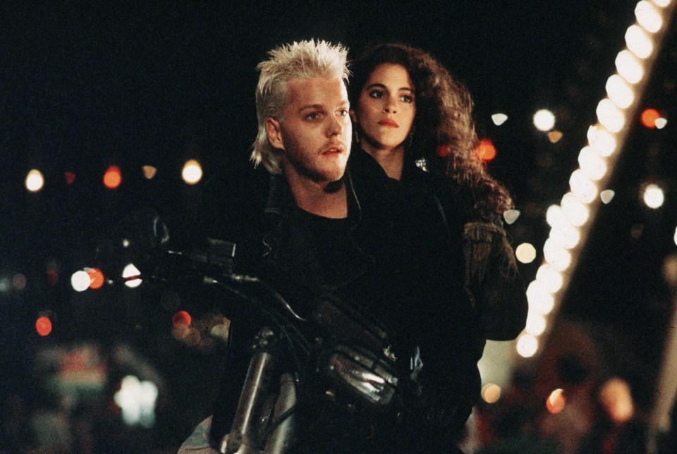 Kiefer Sutherland and Jami Gertz in a scene from *The Lost Boys*.