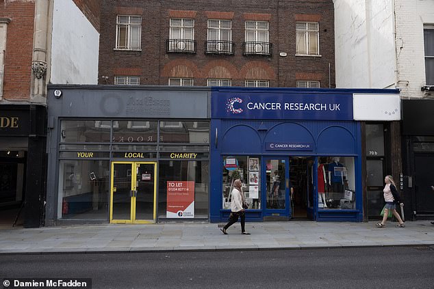Bedford, pictured with a shop that has since closed down. McCormack told Daily Mail that he believes people now need to 'actually feel safe' in order to invest in the local shops and businesses