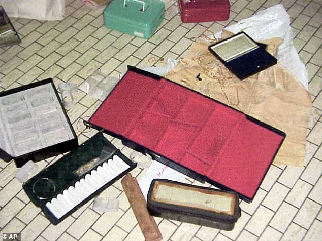 A police photo from just after the heist shows safety boxes and jewellery left behind by the thieves
