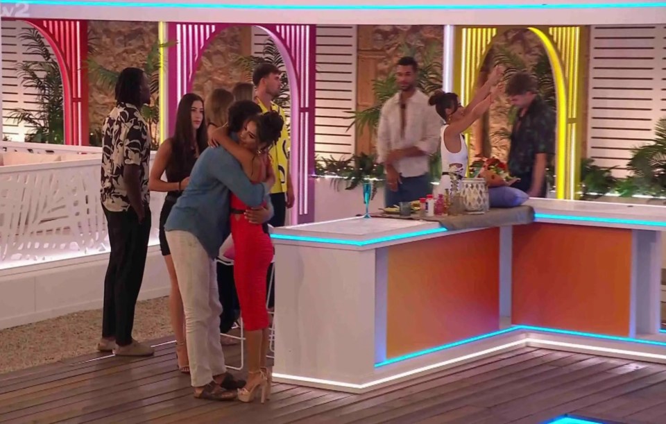 An image collage containing 1 images, Image 1 shows Couple embracing in Love Island villa