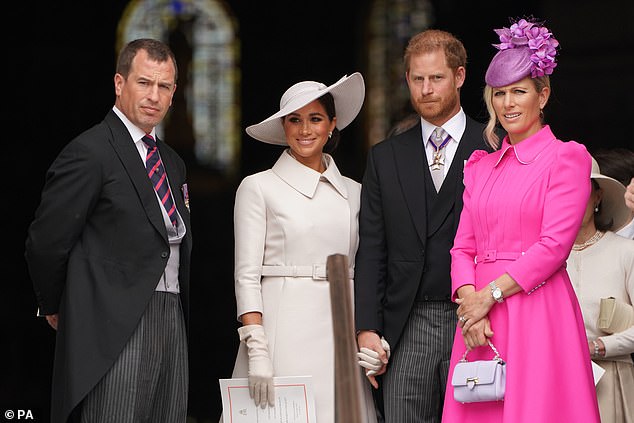 Peter Phillips and his sister Zara Tindall are pictured with Prince Harry and Meghan Markle in June 2022