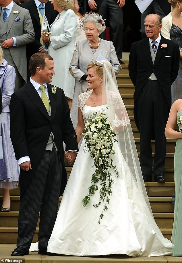 Peter Phillips and his first wife, Autumn Kelly, are pictured lovingly gazing at each other during their wedding day in 2008