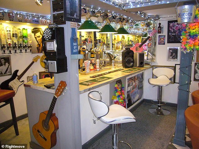The bar is filled with Elvis memorabilia, including pictures of the rock icon, his guitars and cushions with his face on