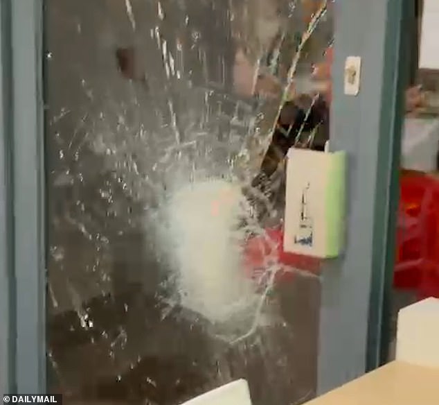 Pictured: The smashed Subway door that cost the branch £1000 to repair