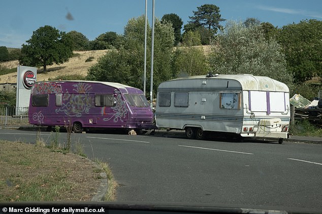 In one enclave, over 40 caravans, battered motorhomes and converted trucks line the streets outside a Premier Inn and an Aldi supermarket