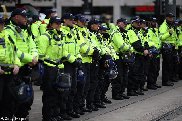 MANCHESTER: Police form a line between counter-protestors from Stand Up to Racism and people attending the Britain First march