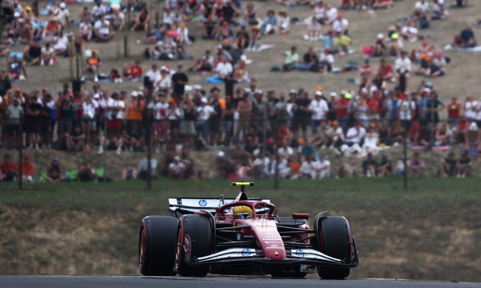 Lewis Hamilton driving a Ferrari Formula 1 car during qualifying.