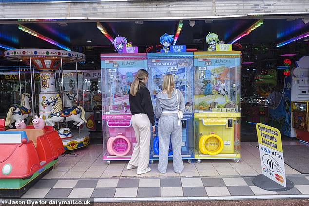Shops and arcades on the main pier, though not as busy as in its heyday, was still bustling with families visiting the area during the summer holidays