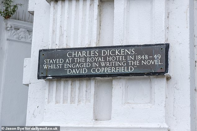 A sign outside the Royal Hotel reads: 'Charles Dickens stayed at the Royal Hotel in 1848-49 whilst engaged in writing the novel "David Copperfield"
