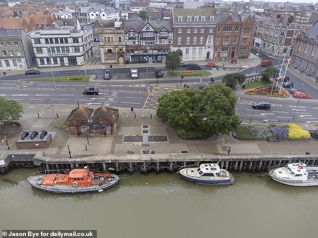 The hotel, on Hall Quay, sits along the River Yare. The building was cordoned off earlier this year after fears a crumbling section near the top was to fall through
