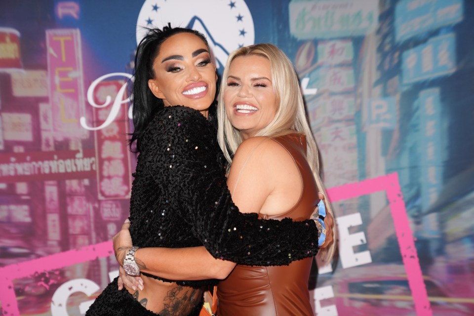 Katie Price and Kerry Katona hugging at a party.