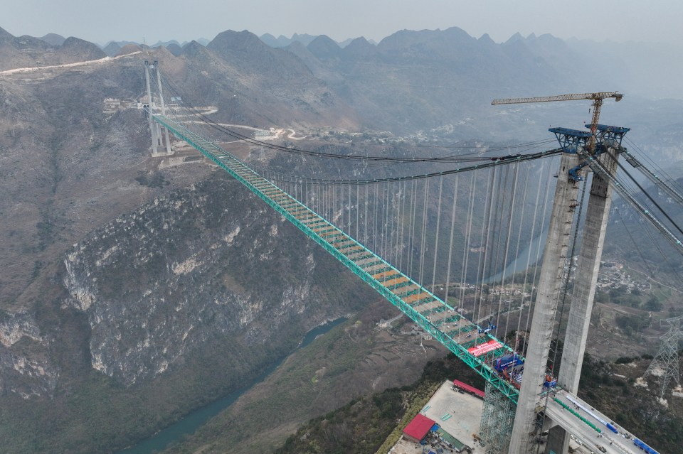 Aerial view of the Huajiang Grand Canyon Bridge under construction in China.