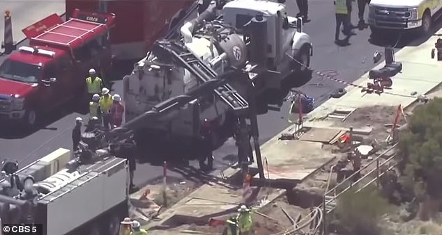 Rescue crews quickly recognized that the massive load of dirt above Baquera was creating dangerously unstable conditions within the trench, and as they attempted to remove the weight, it was clear that the trench was only continuing to collapse (pictured)