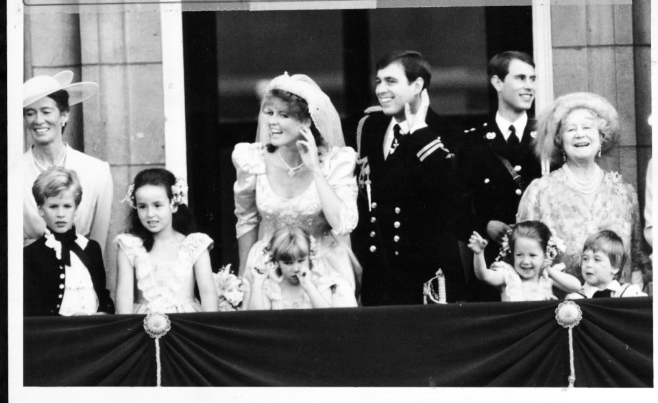 The royal family on a palace balcony after a wedding.