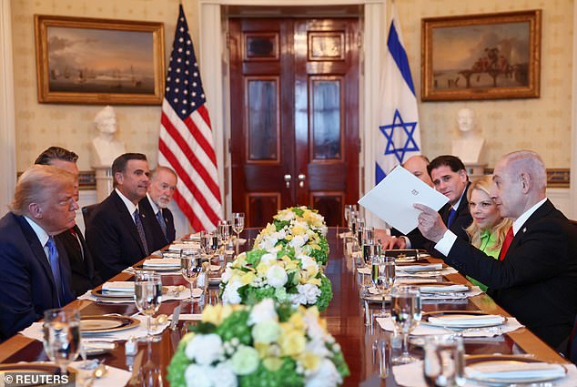 Israeli Prime Minister Benjamin Netanyahu is pictured earlier this month presenting a letter he said he sent the Nobel Peace Prize committee nominating Trump. Pakistan also said it would recommend Trump for the prize