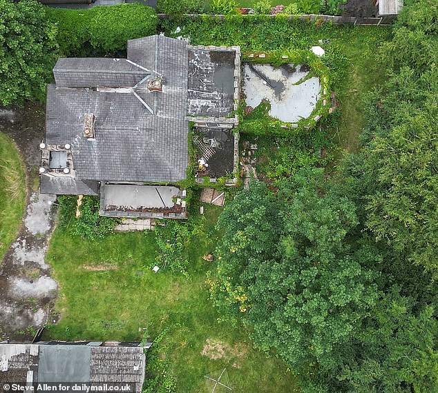 AFTER: Today, the cars have been removed and the imposing house has been sold, but the past still lingers