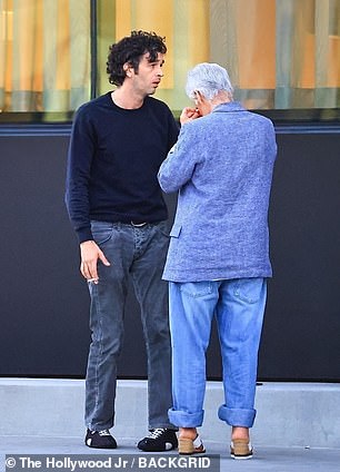 The mother and son were seen speaking outside for a period of time