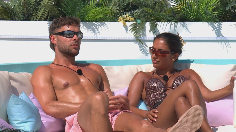 Harry and Toni from Love Island sitting together.