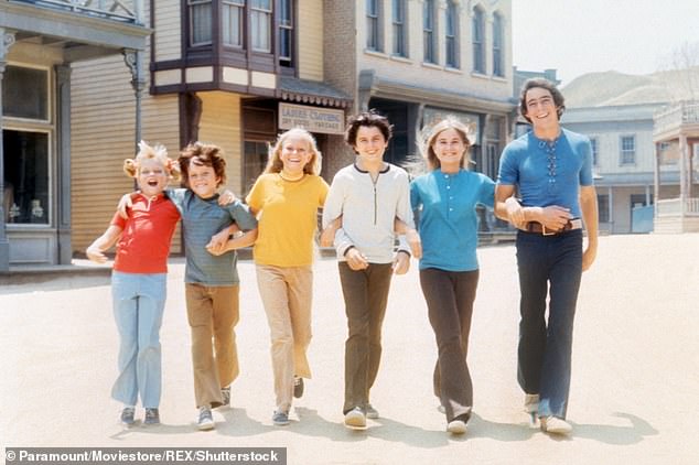Just seven years old at the time, Olsen had been getting her makeup done when she was struck by lighting equipment. She recalled how she did not sue the studios but continued filming the show; pictured from left to right in 1969: Olsen, Lookinland, Plumb, Knight, McCormick, Williams