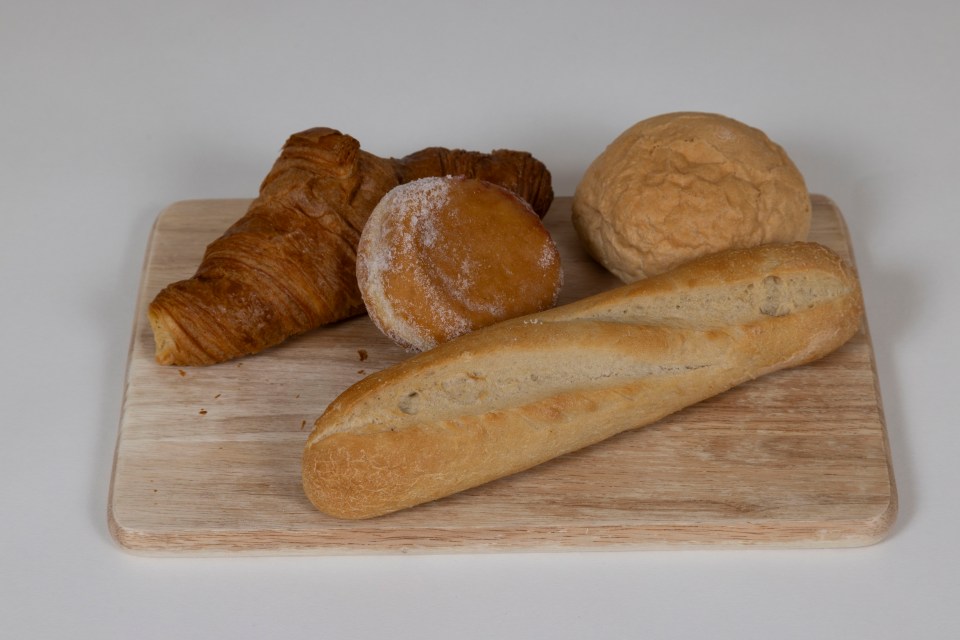 Bakery products on a wooden board.